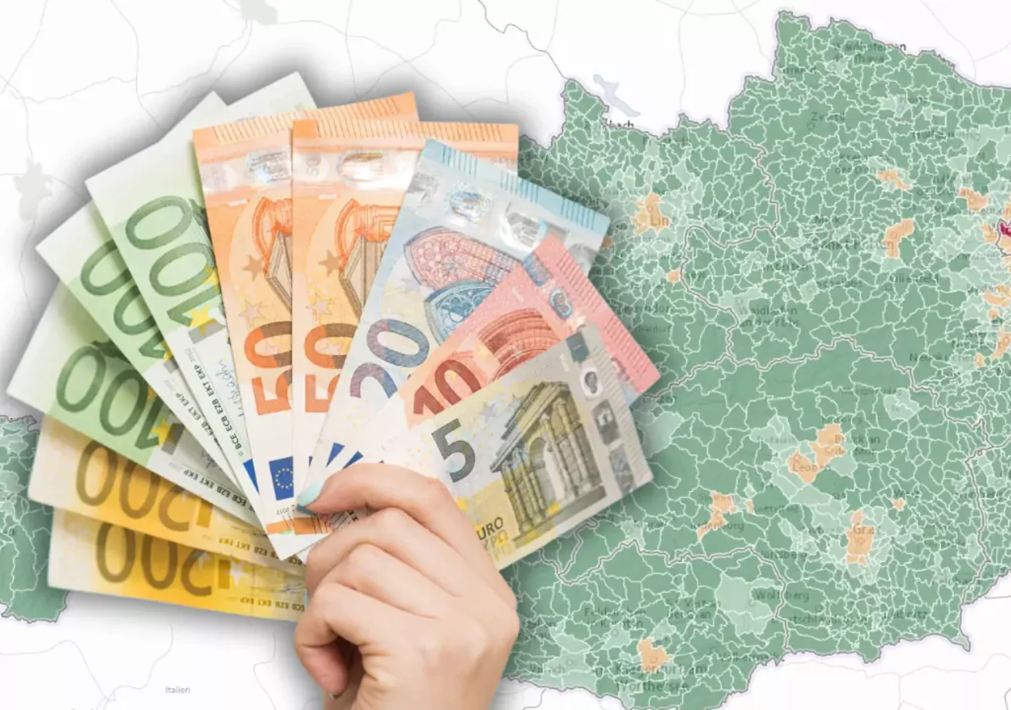 Bild auf 5min.at zeigt eine Österreich-Karte, im Vordergrund ist eine Hand mit Geldscheinen zu sehen.