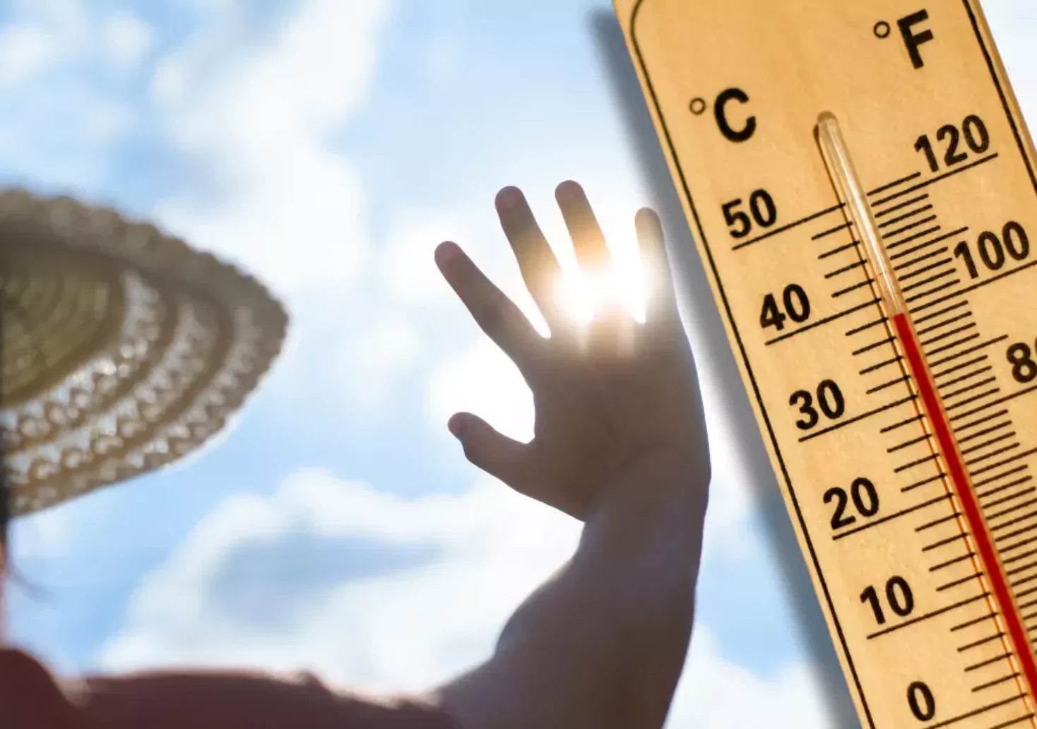 Bild auf 5min.at zeigt ein Thermometer und Sonne im Hintergrund.