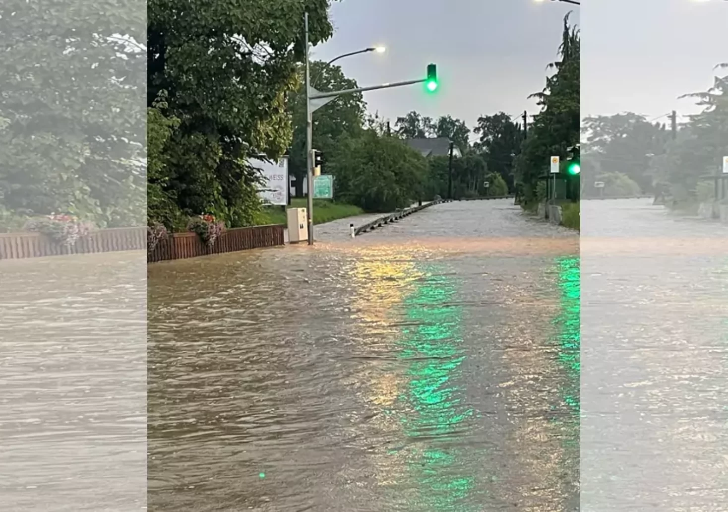 Bild auf 5min,at zeigt eine Überschwemmte Straße.